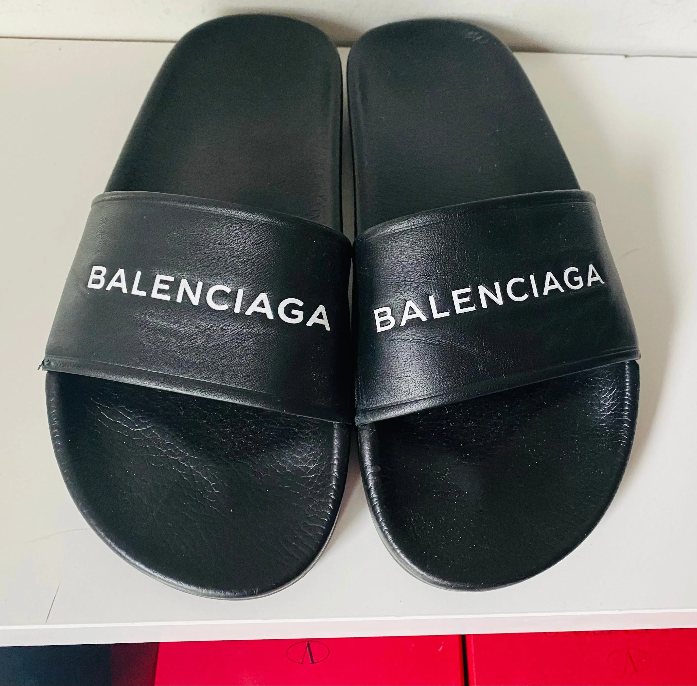 Balenciaga logo slides